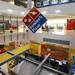 A large Domino's Pizza sign hangs at the headquarters in Ann Arbor. Domino's dug through four floors of the headquarters building to open up space to build the store.  Melanie Maxwell I AnnArbor.com